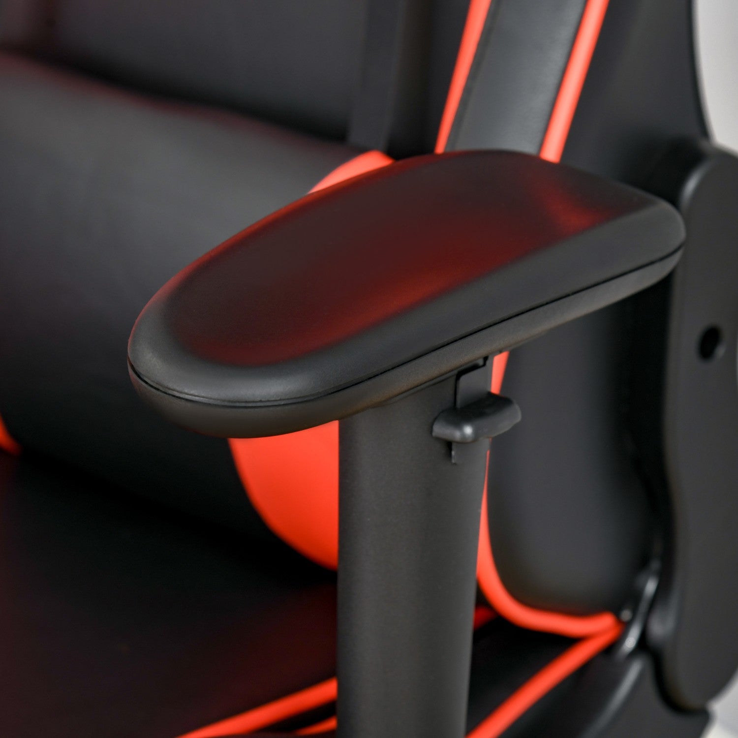 Ergonomisk spelstol med fällbart fotstöd, svart
