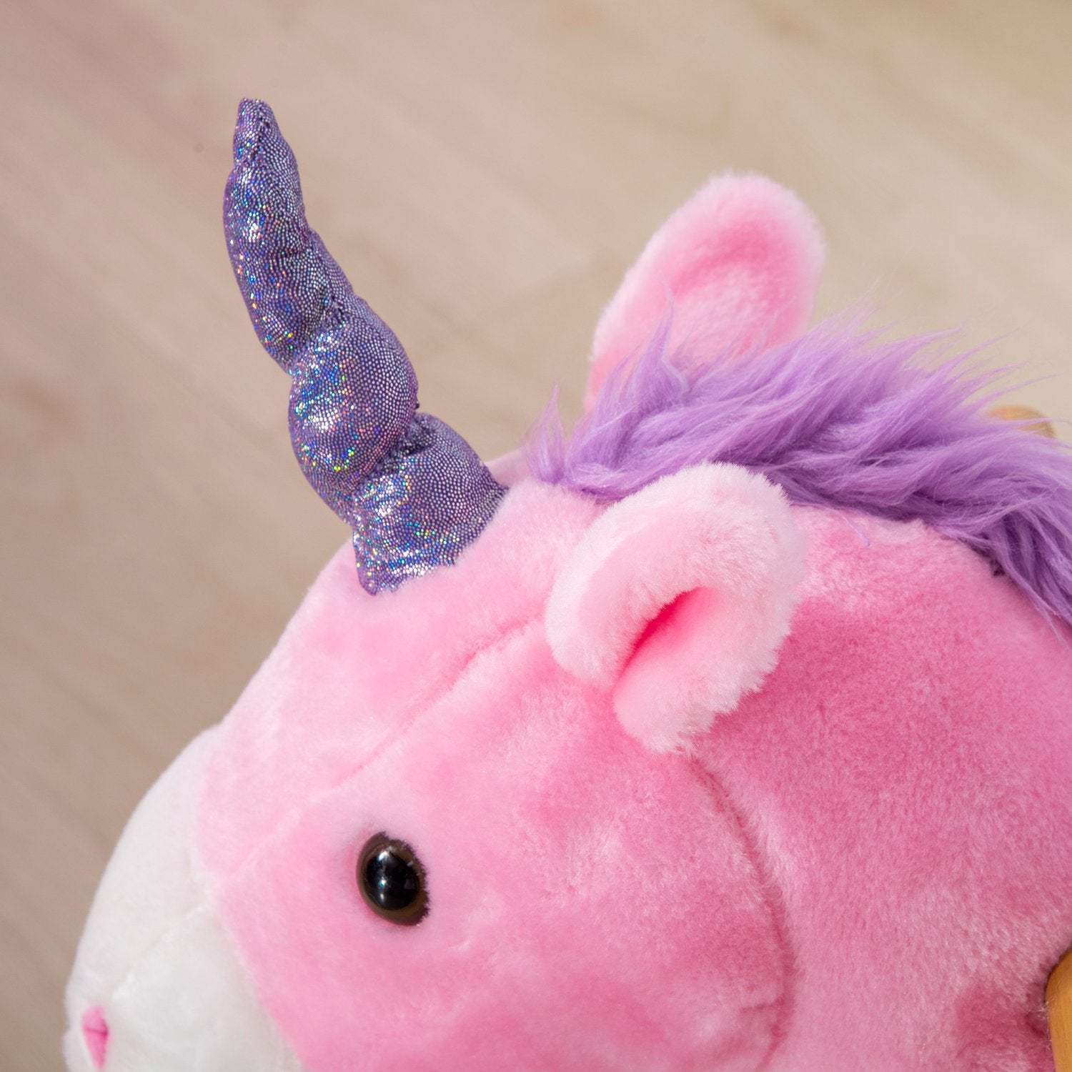 Unicorn gunghäst med vadderad sadel, 4 hjul, rosa