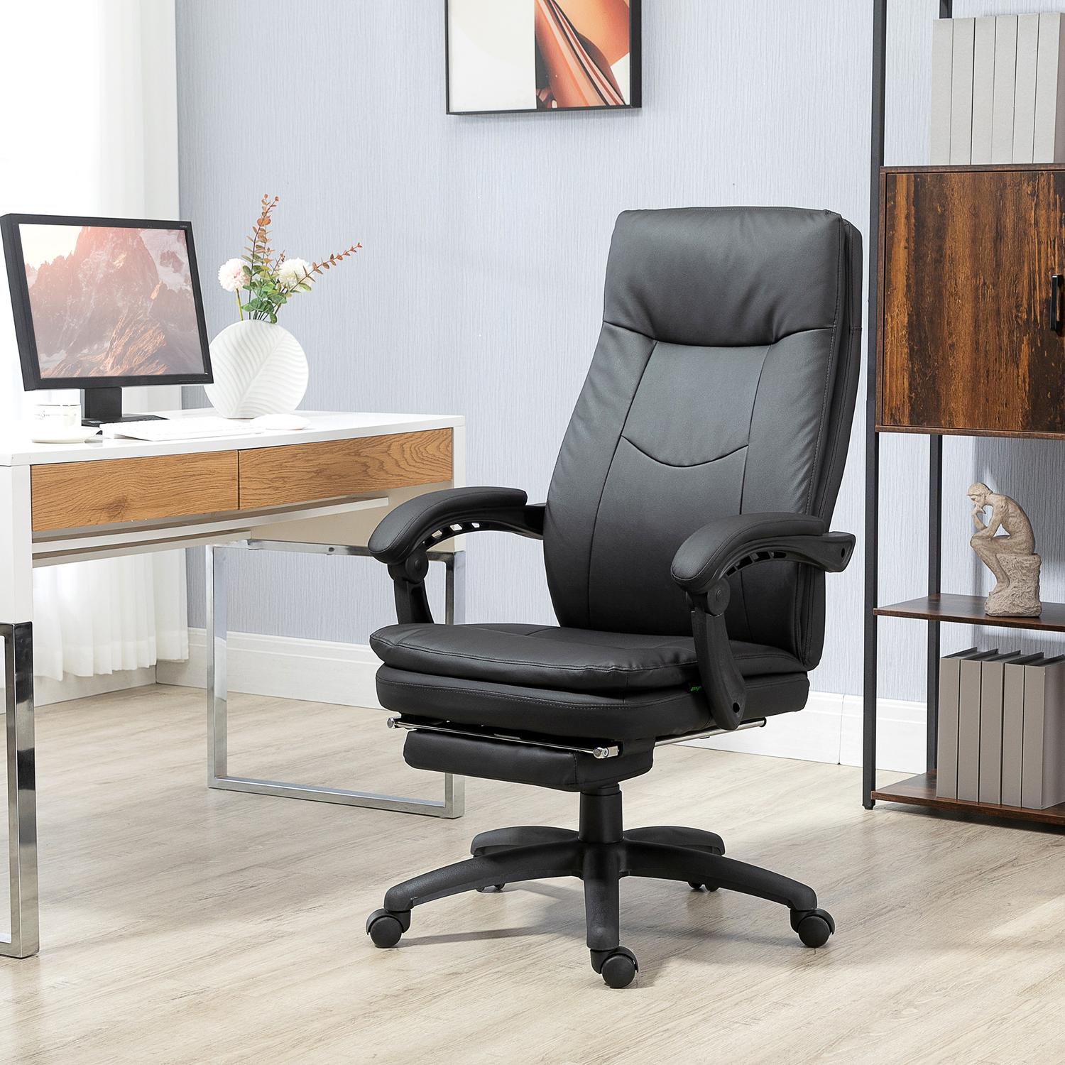 Ergonomisk svart kontorsstol med fotstöd, vadderat ryggstöd